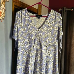 Long short sleeve Polyester and Spandex floral dress in a Medium